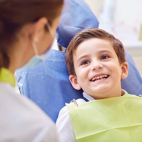 Child smiling during lip and Tongue-Tie follow up visit