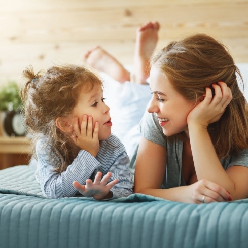 Mother and child speaking after lip and Tongue-Tie treatment