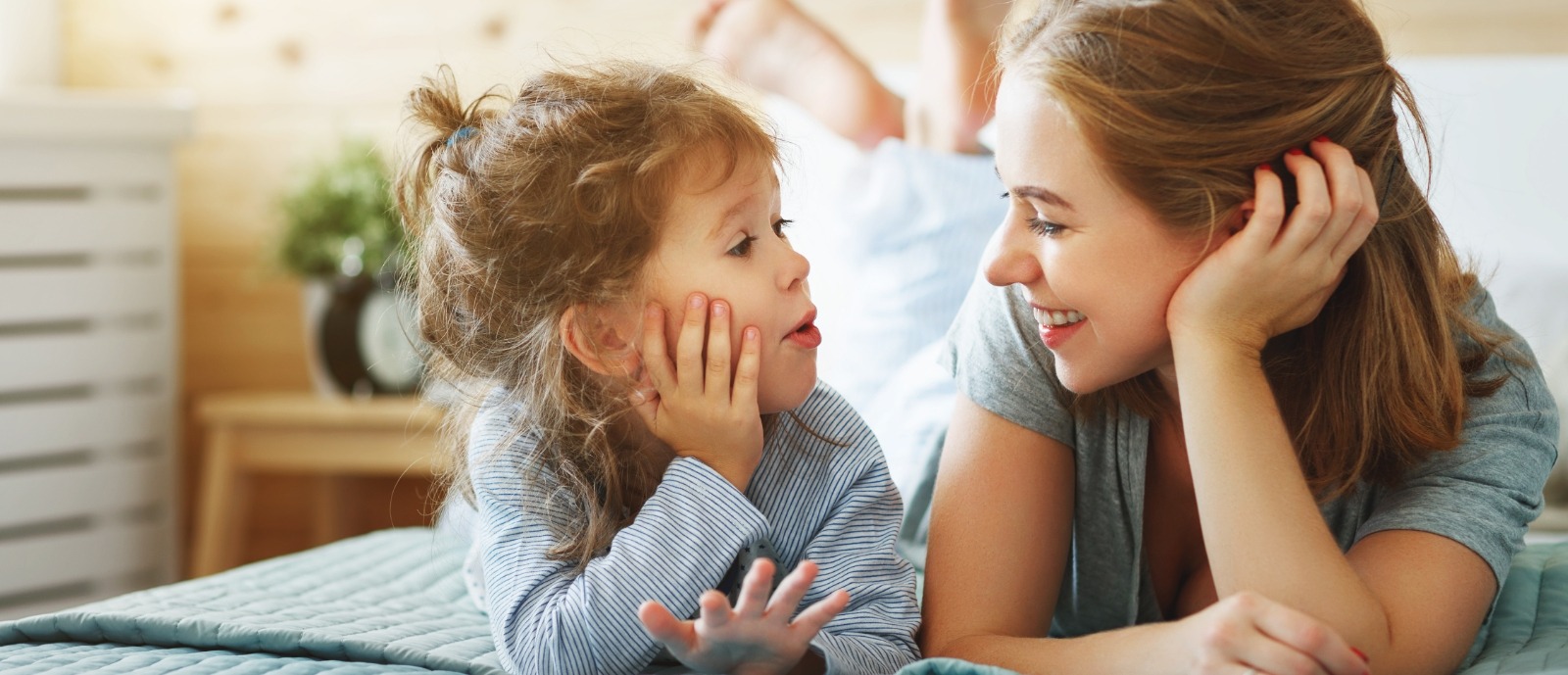 Mother smiling at child after visiting the lip and Tongue-Tie specialist in Chicago