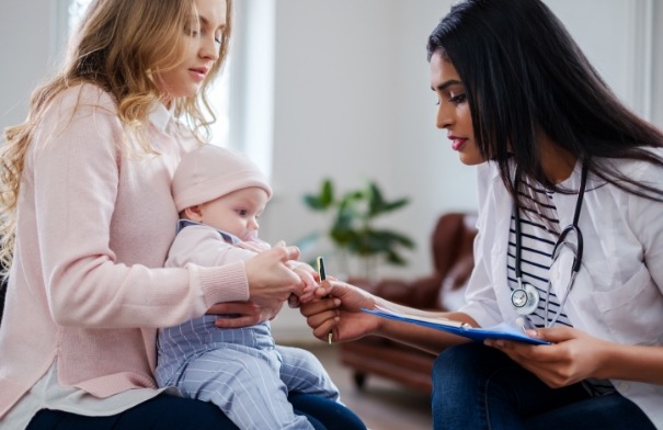 Mother and baby visiting a pediatrician