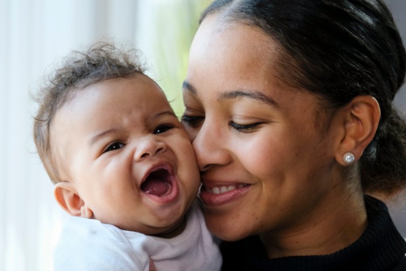 woman with happy baby